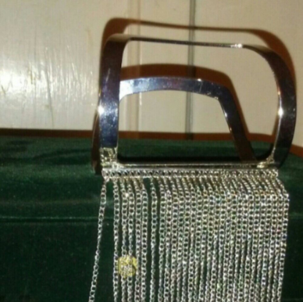 Silver bracelet with attached ring